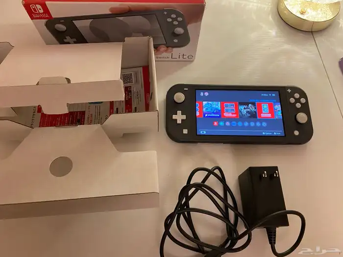 Nintendo Switch Lite نظيف   MicroSD 167GB 12