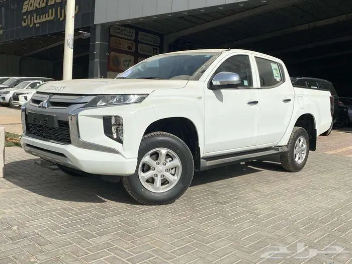 عرض خاص ميتسوبيشي L200 قير عادي فل كامل سعودي دبل 2023 0