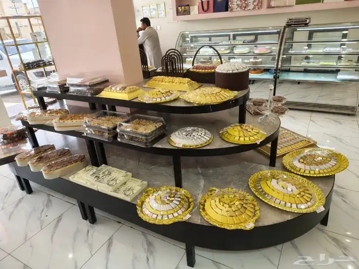 للتقبيل بالكامل محل حلويات 5