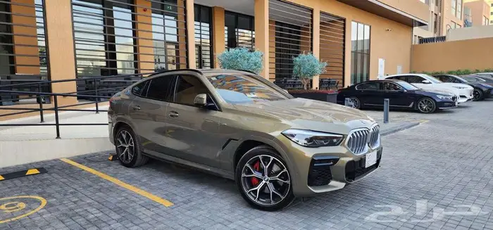 BMW X6 M KIT 2022   بحالة الوكالة  ممشى 56 ألف 12