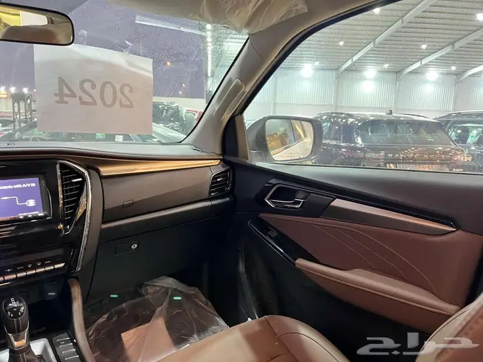ايسوزو MU-X موديل 2024 فل كامل دبل لدى خالد للسيارات 9