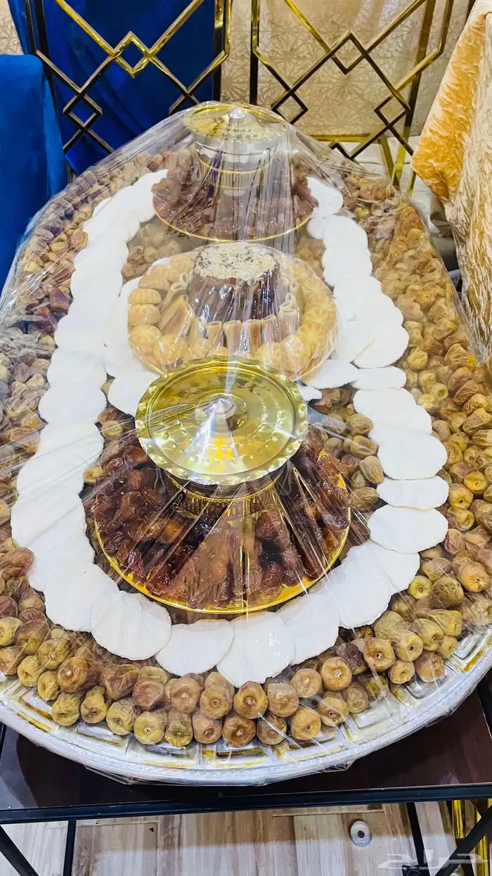 تجهيز صواني التمر والمضير والسمن 11