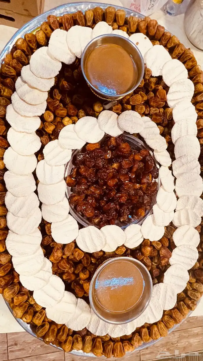 تجهيز صواني التمر والمضير والسمن 13