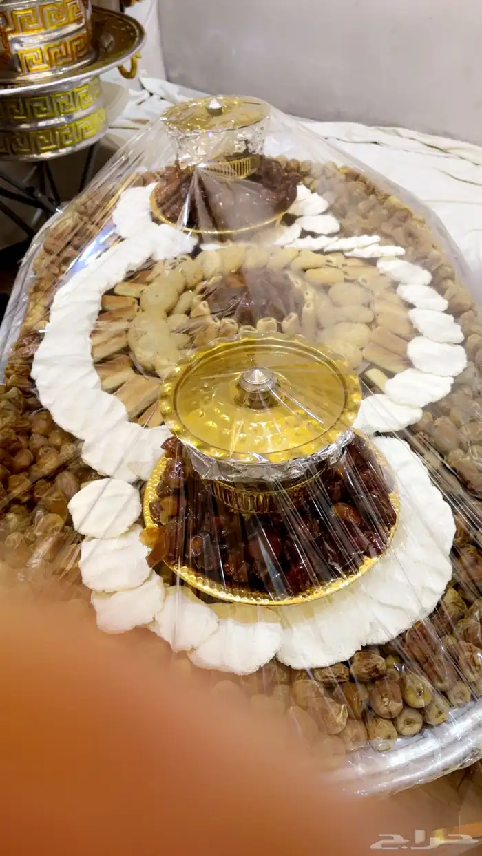 تجهيز صواني التمر والمضير والسمن 0