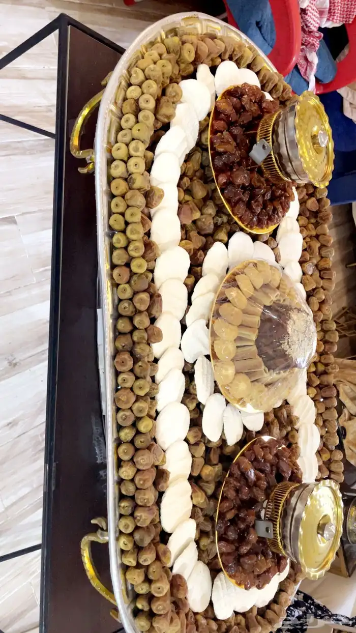 تجهيز صواني التمر والمضير والسمن 12