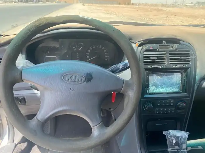 كيا اوبتيما 2004 4