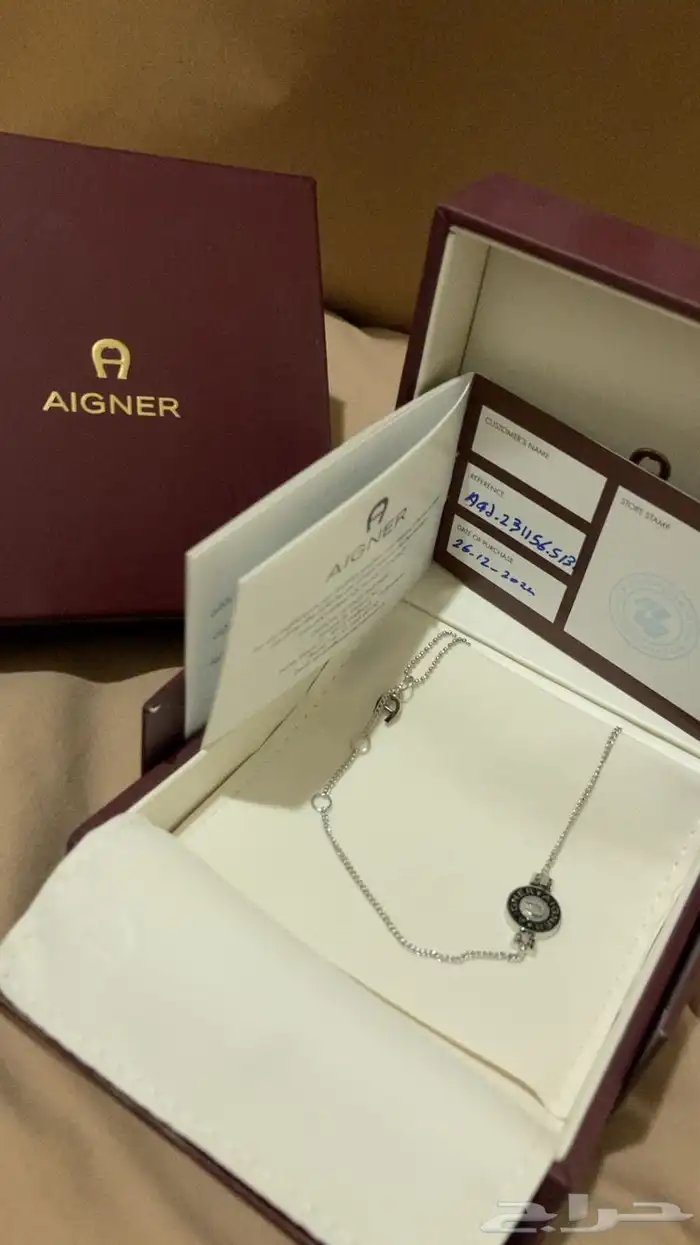 اسوارتين الاولى من AIGNER والثانيه من FAYENDRA 0