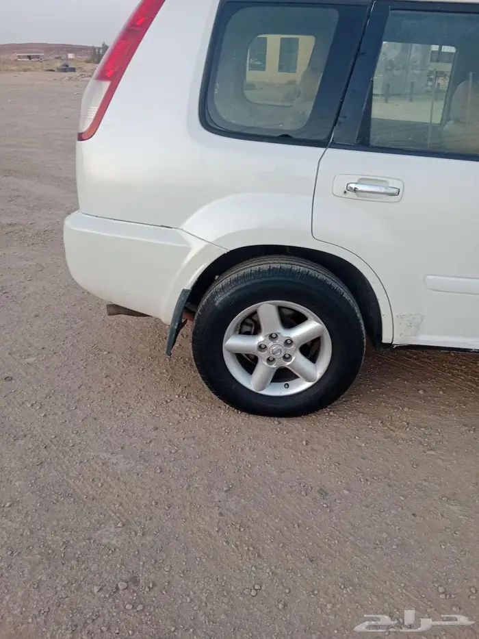 نيسان اكس تريل 2004 4