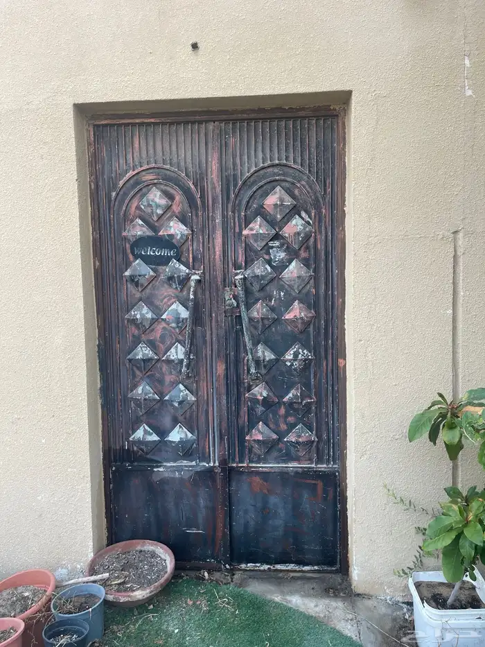 باب حديد ثقيل 0