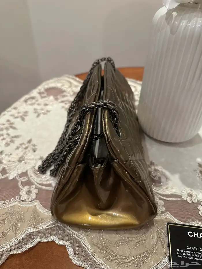 شنطة شانيل ذهبي 4
