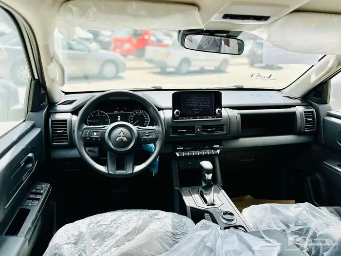 ميتسوبيشي L200 غمارتين دبل نص فل اوتوماتيك 2024 8