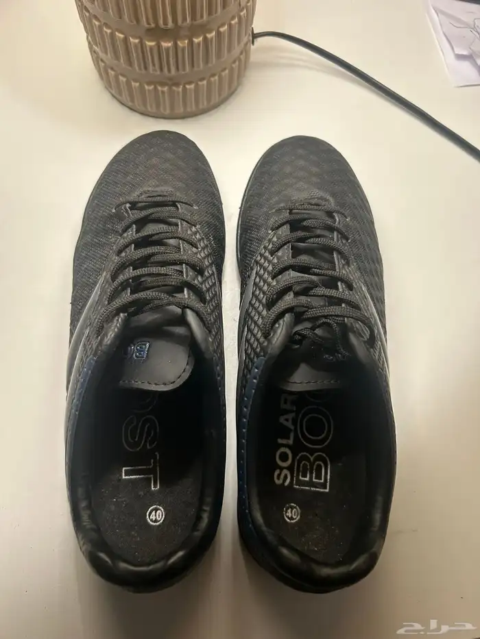 جزمة رياضية اديداس كحلي وأسود adidas solar boost 4