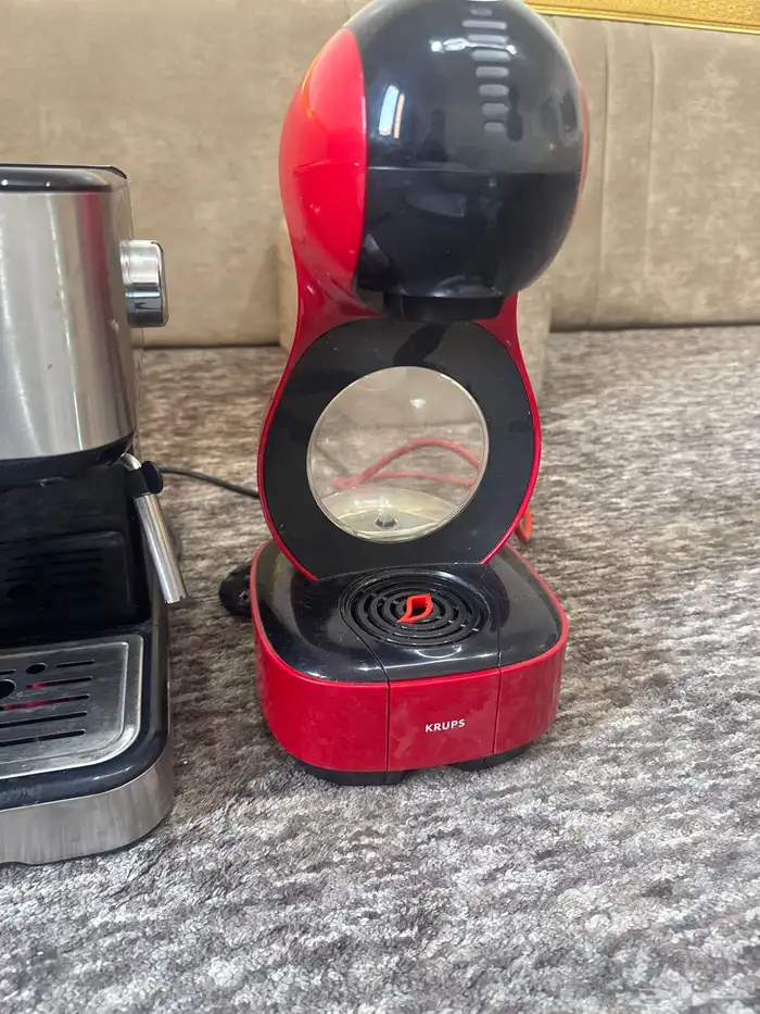 أله قهوه اسبريسو مع تبخير اله v60شركه فليبيس  اله كبسولات 1