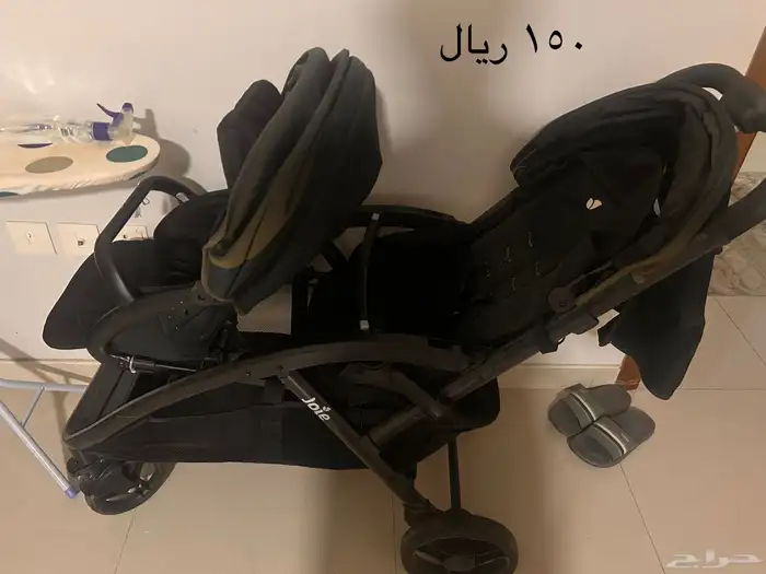 عربة أطفال تؤام بحالة جيده 0