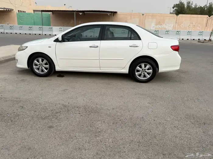 كورولا ابيض 2009 6