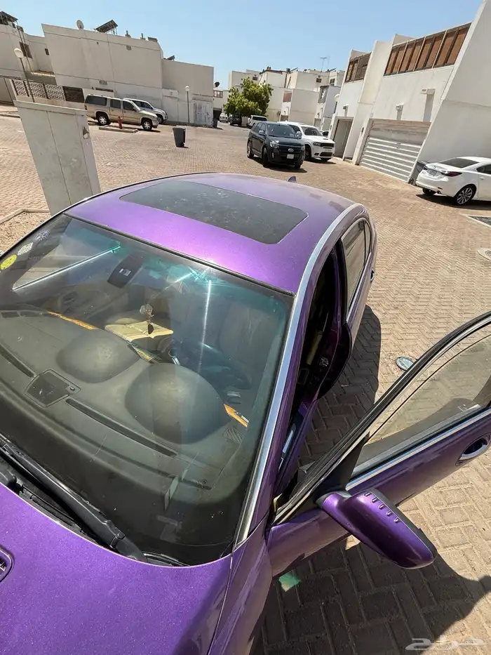 مع لوحه مميزه BMW 750E بنفسجي مستعمله للبيع 5