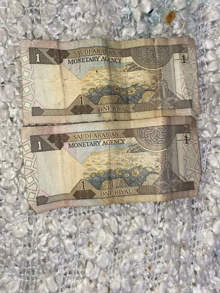 فلوس الملك فهد قديم فيه عفطات خفيفه وا فيه واحد نضيف بس قطع 2