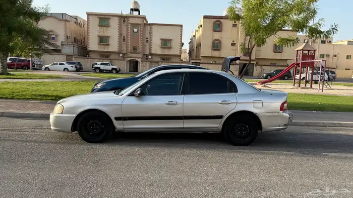 اوبتيما 2004 4