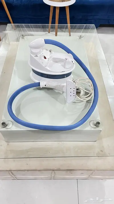 مكواة بخارية 0