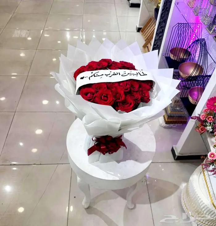 باقة ورد حمراء تغليف ابيض 0
