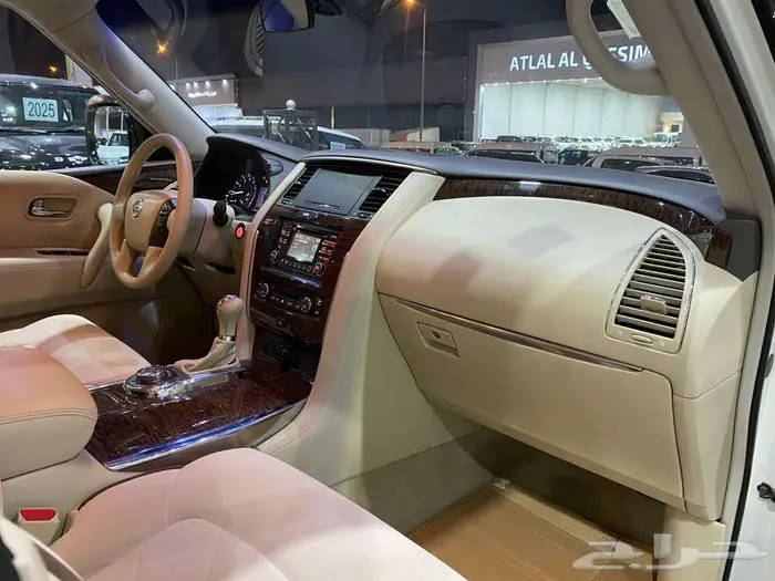 نيسان باترول LE 2016 ابيض ماشيه 225000كم 33