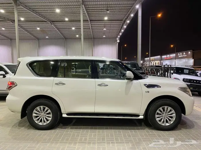 نيسان باترول LE 2016 ابيض ماشيه 225000كم 10