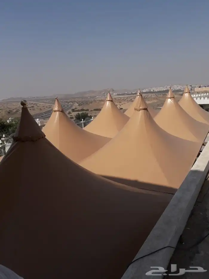 حداد مظلات تلبيس أبواب خشب سواتر 3