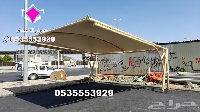 شركة متخصصة في تركيب نظام مظلات مواقف السيارات الجديد 20