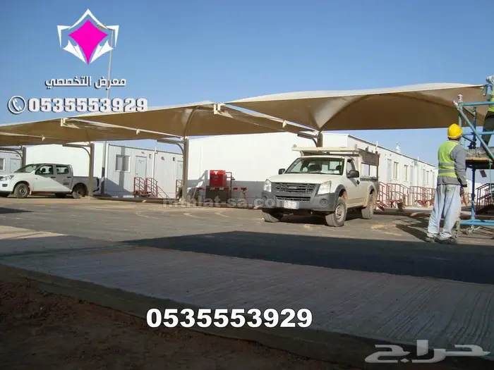 شركة متخصصة في تركيب نظام مظلات مواقف السيارات الجديد 30