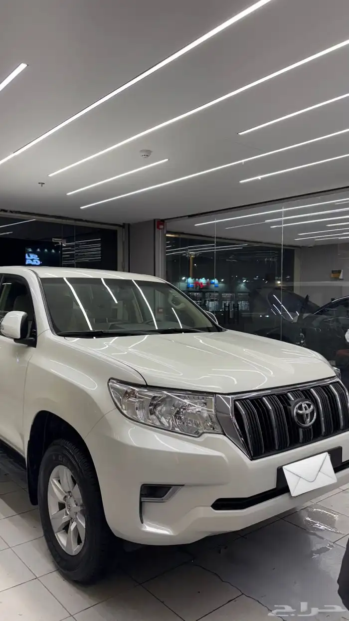 للبيع برادو TXL 2023 أبيض 6 سرندل (ممشى 1386 KM )وكاله نادر 1