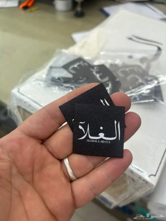 مطابع لطباعة لوقو القماش للعبايات والنقابات بكجات تغلفي خاص 12
