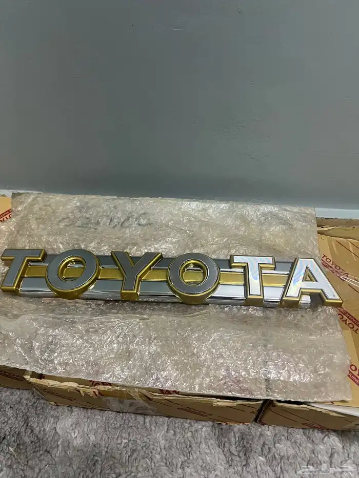 علامة شبك مذهبه هايلوكس89-91 1