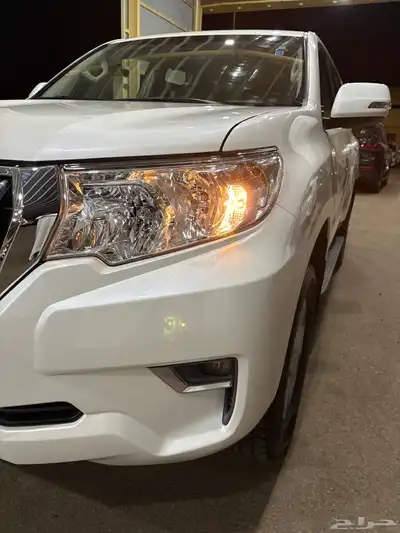 للبيع برادو TXL 2023 أبيض 6 سرندل (ممشى 1386 KM )وكاله نادر index