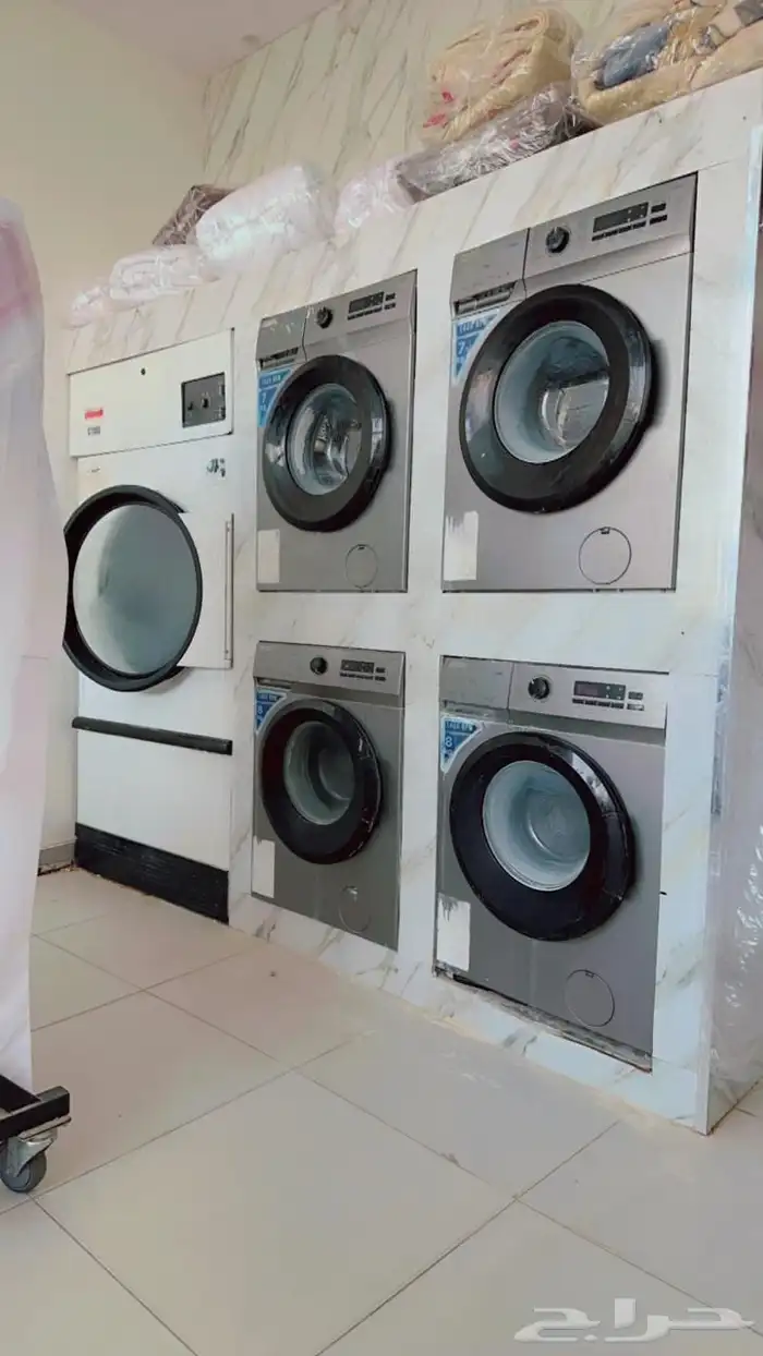 مغسلة ملابس لتقبيل بكامل أغراضها 3