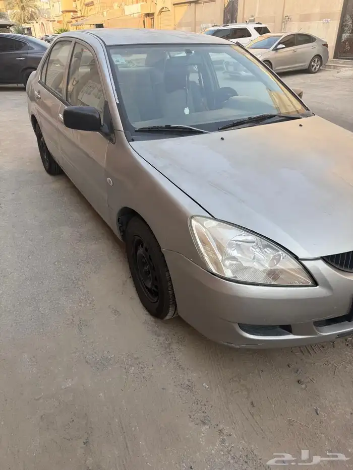 للبيع لانسر 2005 1