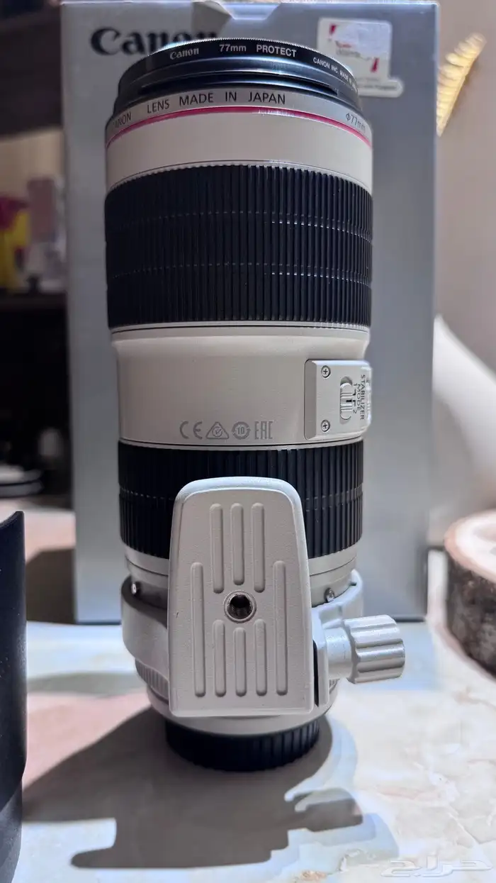 عدسة كانون 70-200 EF الاصدار الثاني فتحة 2.8 بمانع اهتزاز 12