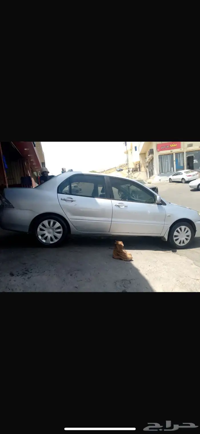 سياره موستبيشي لانسر2006 11