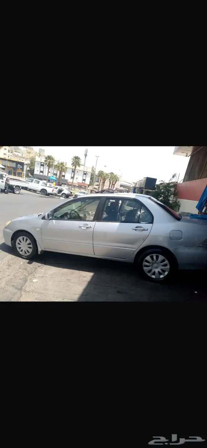 سياره موستبيشي لانسر2006 8