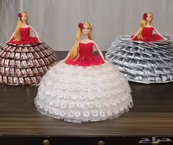 تصميمات جميله وجديده لتوزيعات الافراح والرايات والمواليد 8