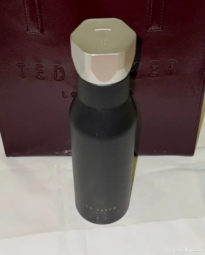 شنطة ماركة تيد بيكر tedbaker أصلية مع ( مق ) تيدبيكر 6