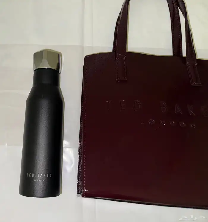 شنطة ماركة تيد بيكر tedbaker أصلية مع ( مق ) تيدبيكر 4
