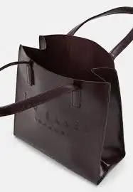 شنطة ماركة تيد بيكر tedbaker أصلية مع ( مق ) تيدبيكر 2
