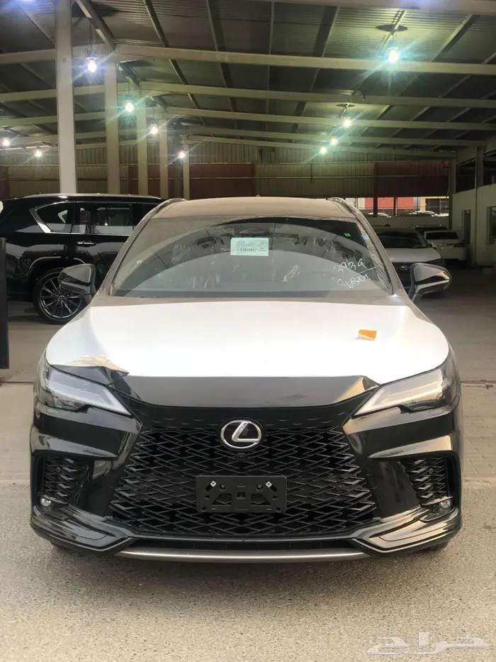 لكزس RX 500 FH سعودي 2025 هايبرد أسود داخل أحمر 12