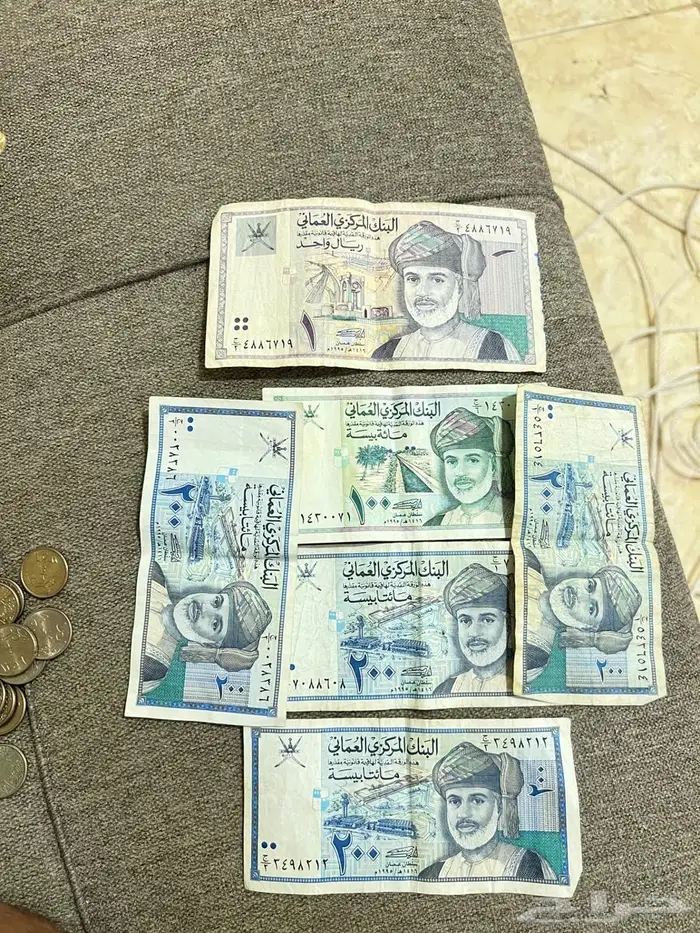 عملات عمانيه فئة 200 بيسه و 100 بيسه و واحد ريال تاريخ 1995 0