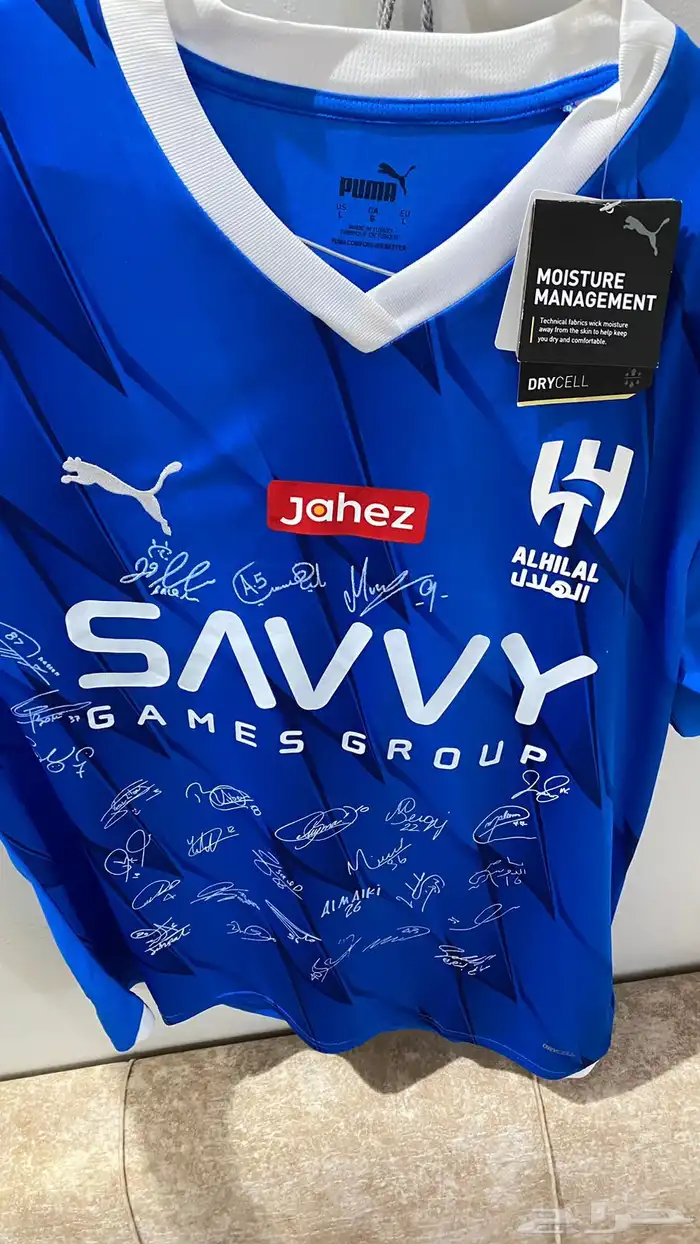 تيشيرت الهلال موقع من الاعبين موسم 2024 0