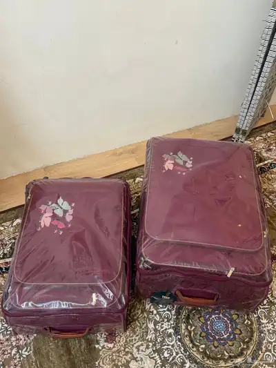 الشنطه سفرة عنابي index