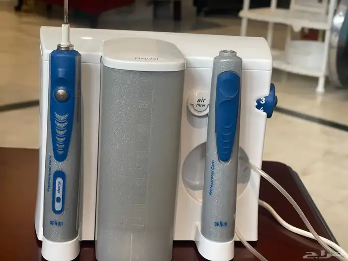 فرشة أسنان كهربائية وبخاخ ماء براون 0