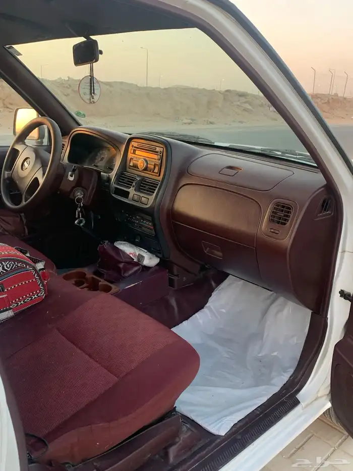 نيسان دتسن GL- 2012 غمارتين أبيض 9