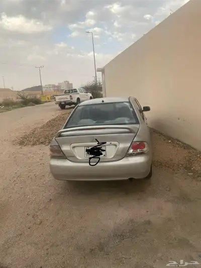 سياره لانسر بومه 2009 index