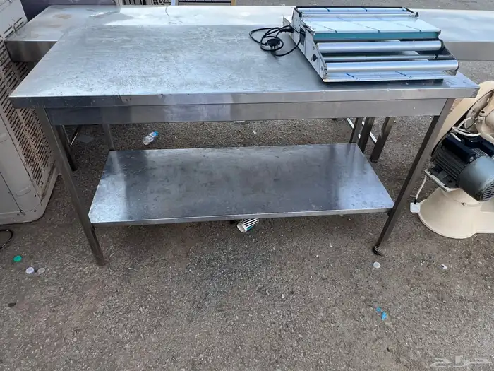 طاولات ستيل و عجانة ومكينة تغليف 0